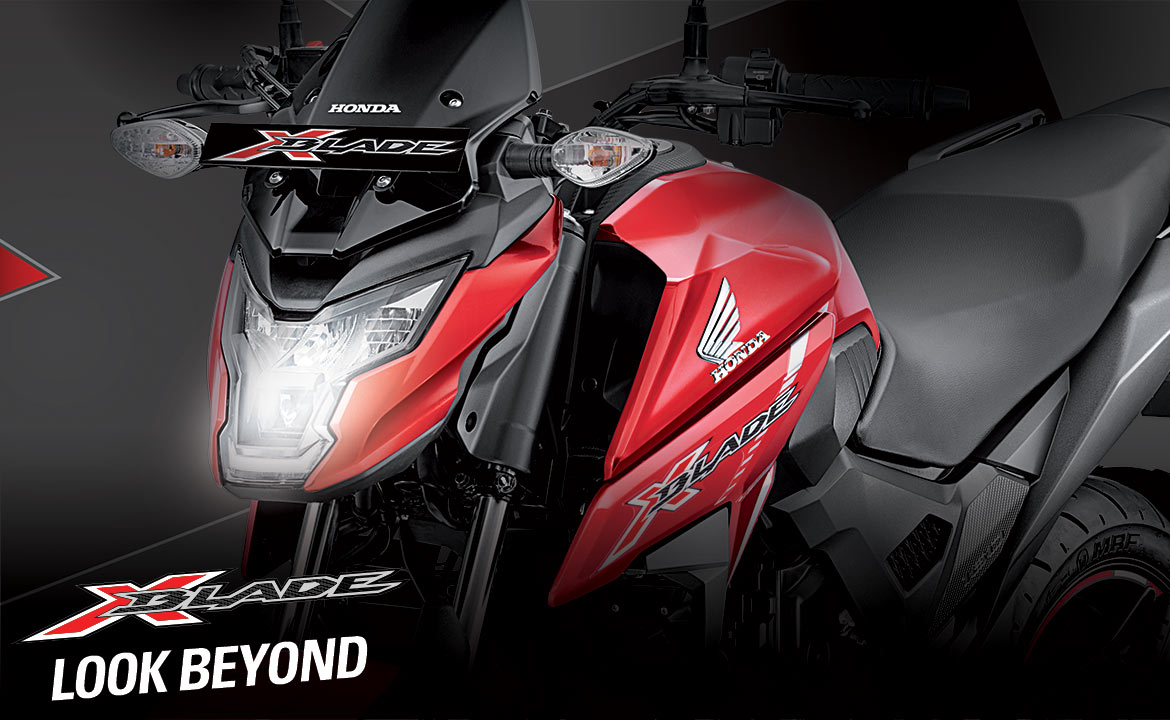 Available Red Honda X Blade at reasonable price exclusively at Rushabh Honda, Nashik. Best Two wheeler Honda Dealers for years.